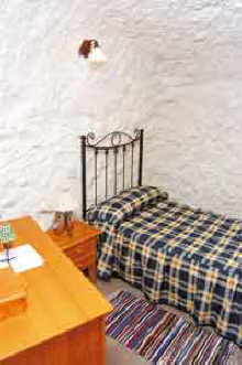Gran Canaria Hhlenhaus Villa Baja. Ein Schlafzimmer mit Einzelbett