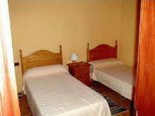 La Gomera Ferienhaeuser Casa Los Manantiales auf La Gomera. Schlafzimmer mit Einzelbetten.