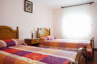 La Palma Nordost - Barlovento - Finca Los Dragos - Ein Schlafzimmer mit Einzelbetten